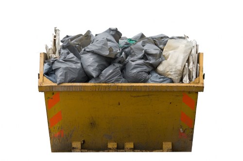 Professional waste clearance team at a building project