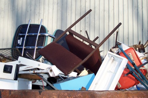 Recycling center handling old furniture in Acton