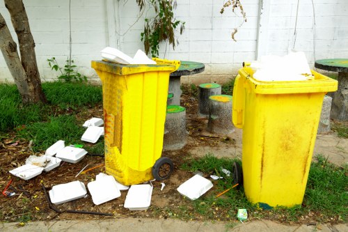 Responsible garden waste disposal by Acton clearance professionals